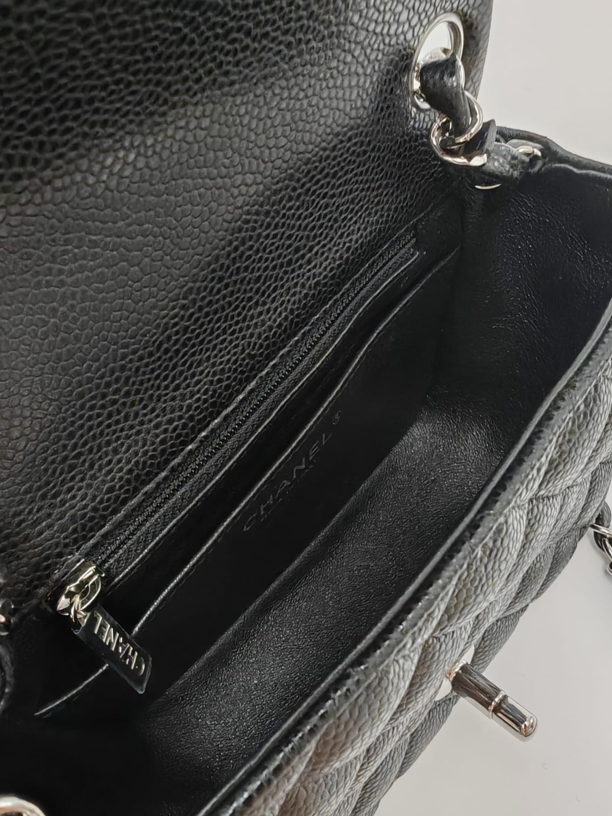 CHANEL Classic Mini Rectangular Flap Bag – Black Caviar with Silver Hardware