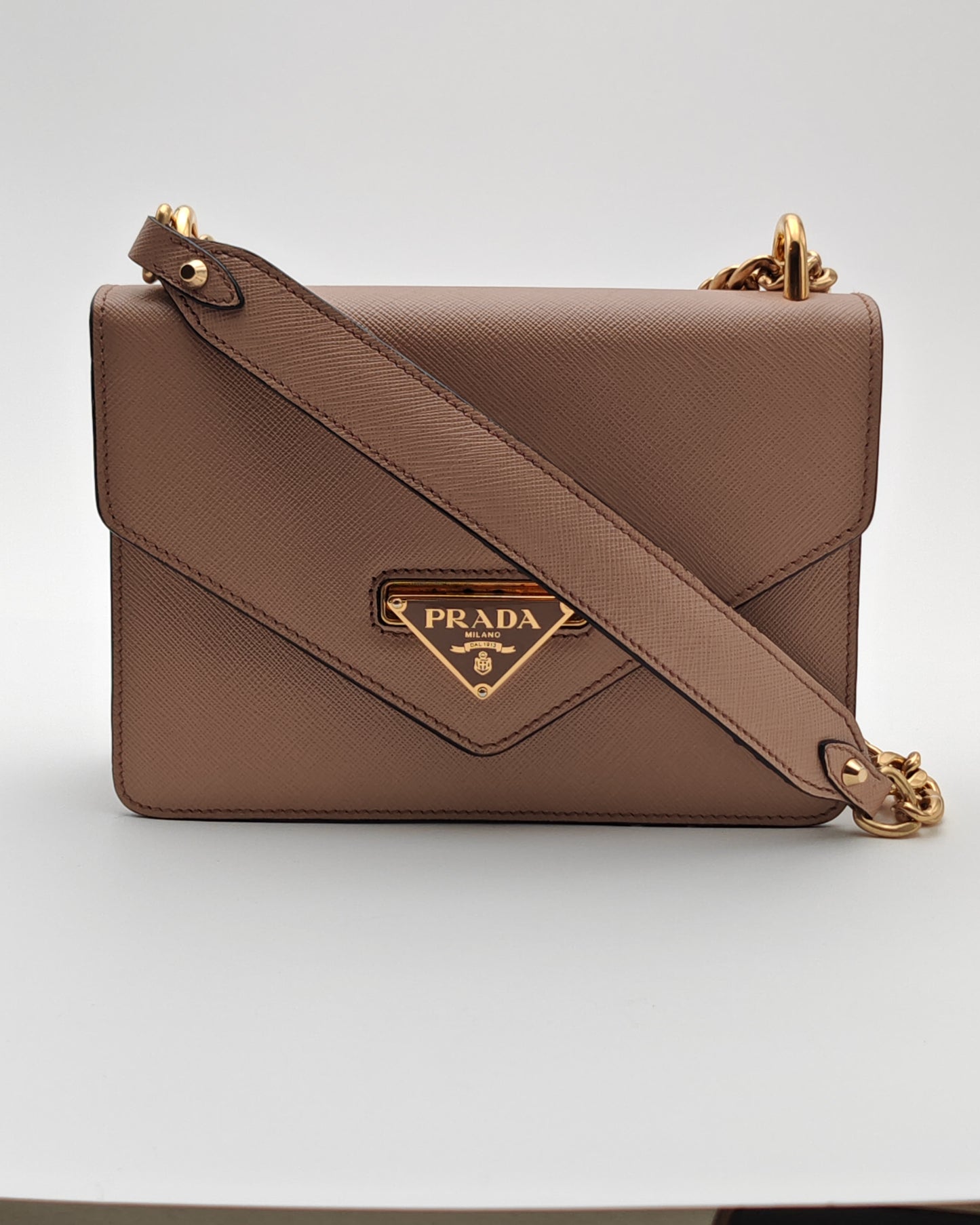 Prada Diagramme Envelope Shoulder Bag in Nude Saffiano Leather with Gold Hardware.
