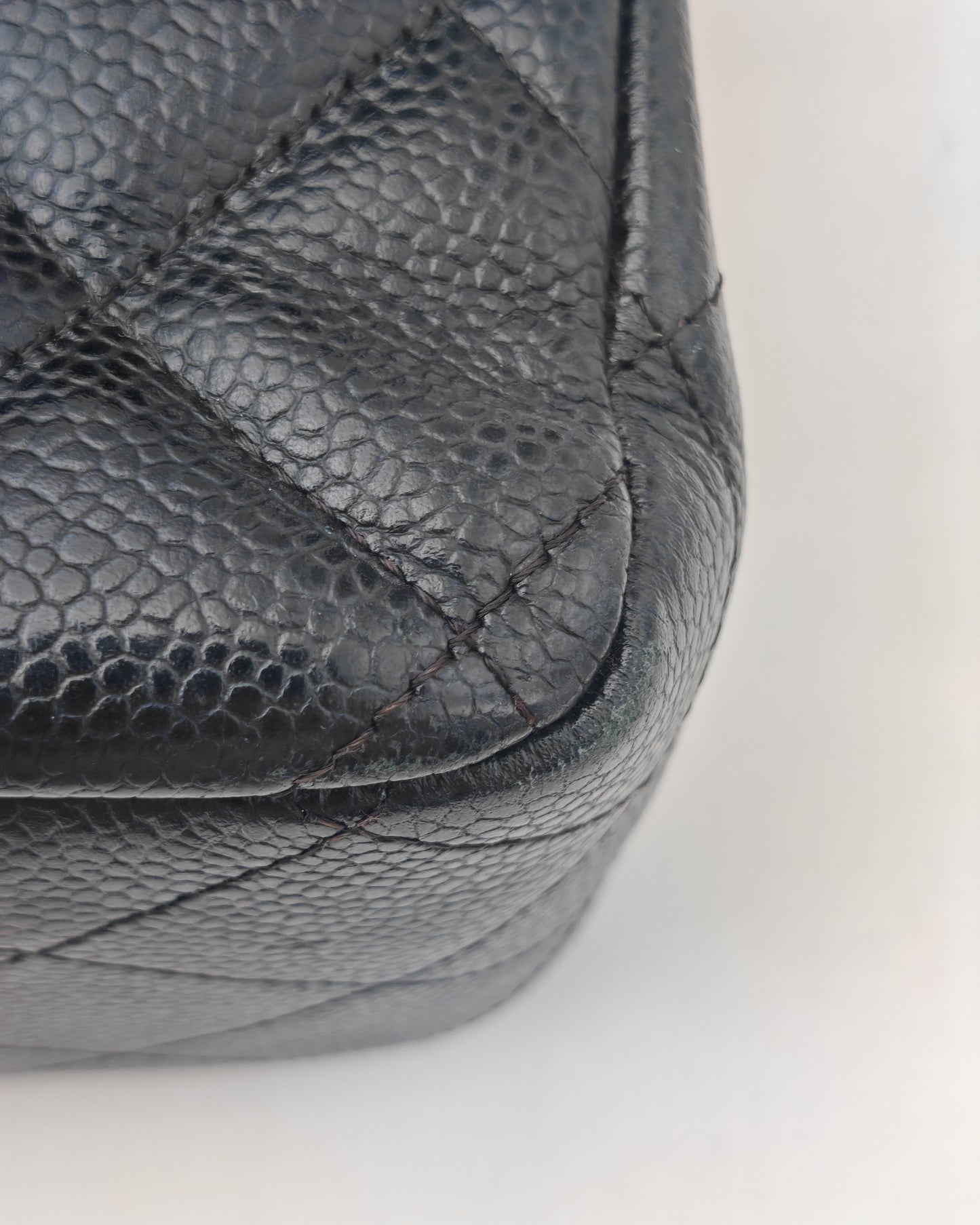 Chanel Classic Flap Bag – Jumbo Black Caviar Leather with Silver Hardware
