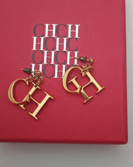 Carolina Herrera Gold-Tone “CH” Logo Drop Earrings – Statement Design