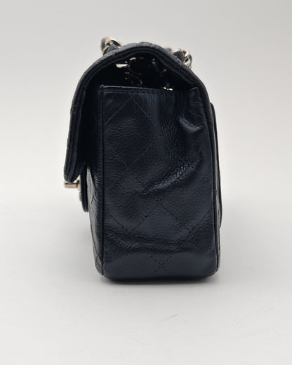 Chanel Classic Mini Flap Bag in Black Caviar with Silver Hardware