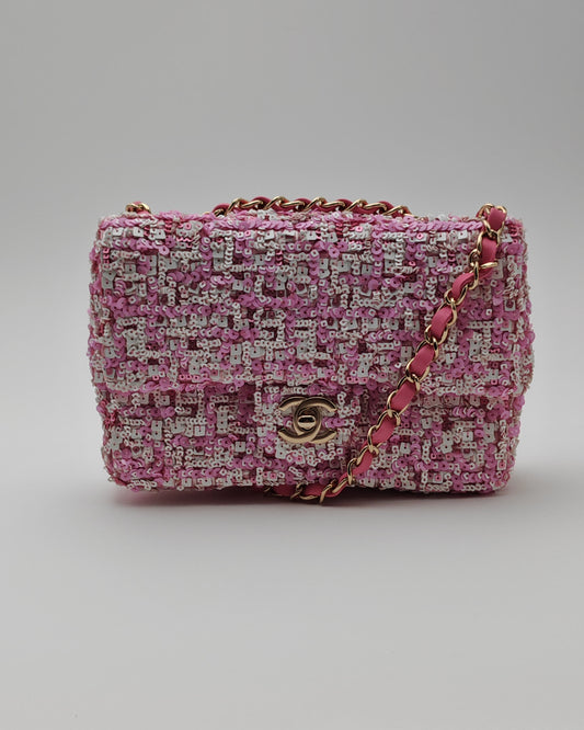 Chanel Mini Flap Bag in Pink Sequin Tweed with Gold Hardware.