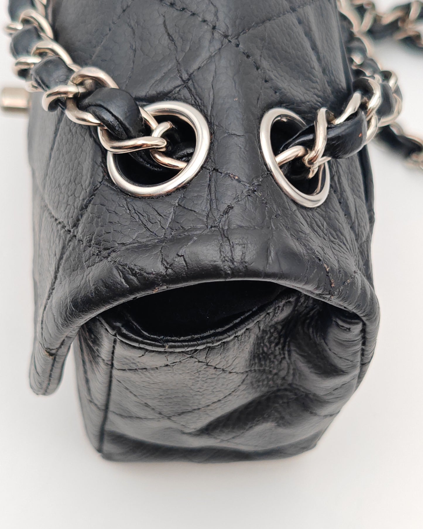 Chanel Classic Mini Flap Bag in Black Caviar with Silver Hardware