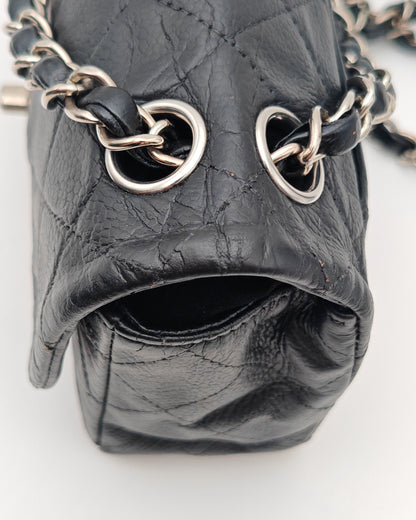 Chanel Classic Mini Flap Bag in Black Caviar with Silver Hardware