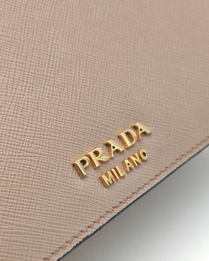 Prada Diagramme Envelope Shoulder Bag in Nude Saffiano Leather with Gold Hardware.
