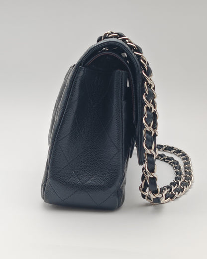 Chanel Classic Flap Bag – Jumbo Black Caviar Leather with Silver Hardware