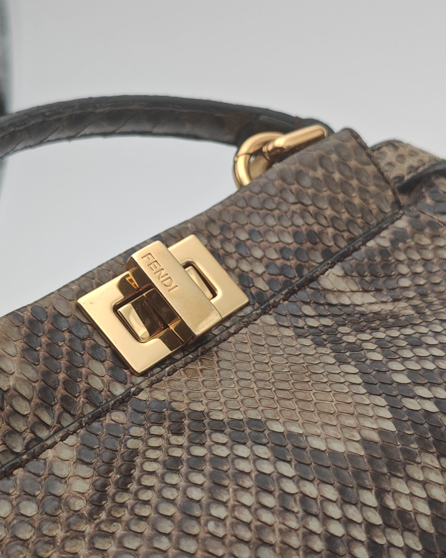 Fendi Mini Peekaboo Bag in Brown Python with Gold Hardware.