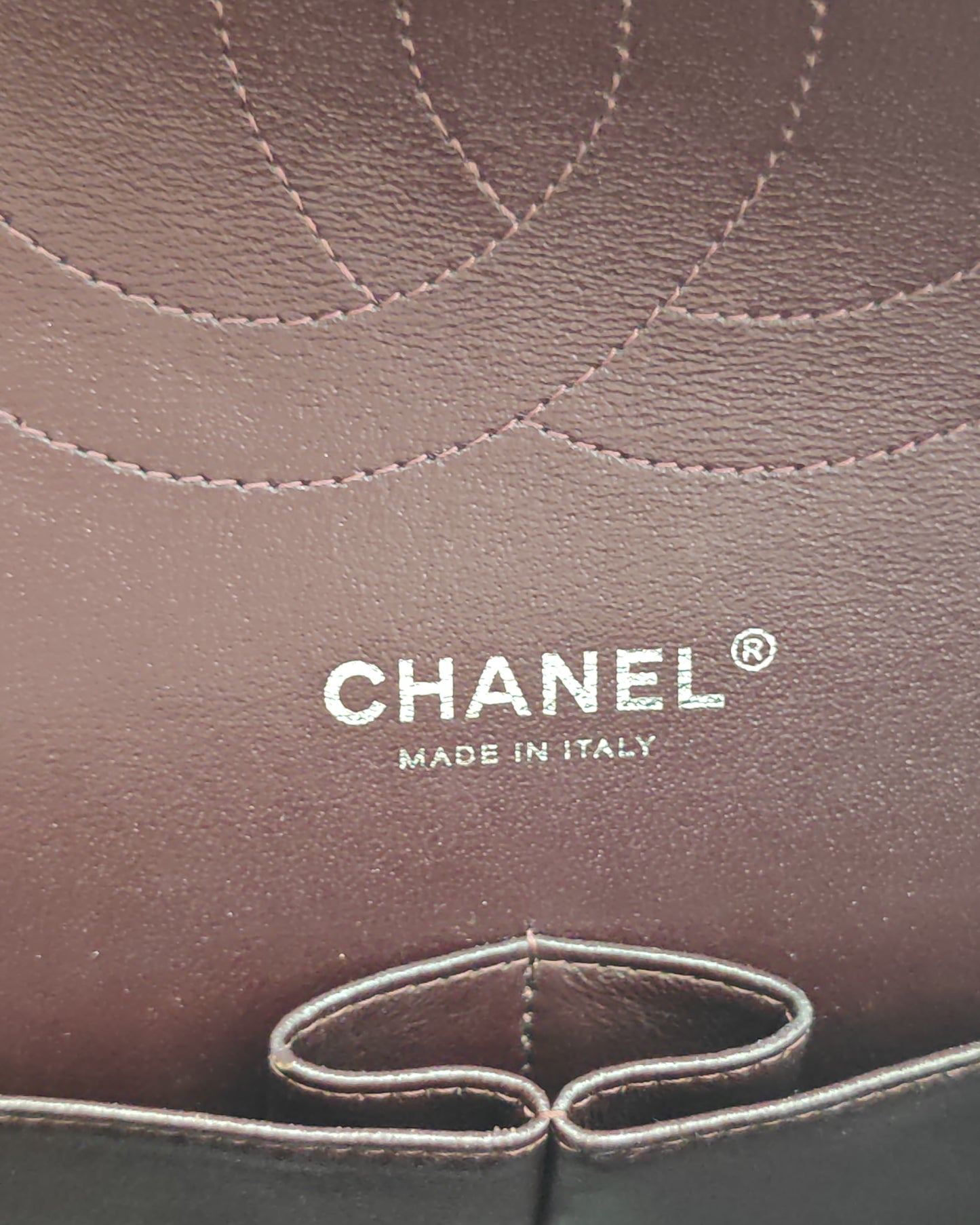 Chanel Classic Jumbo Double Flap Bag in Dark Burgundy Caviar Leather with Silver Hardware.
