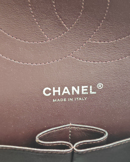 Chanel Classic Jumbo Double Flap Bag in Dark Burgundy Caviar Leather with Silver Hardware.