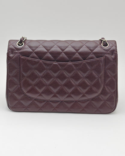 Chanel Classic Jumbo Double Flap Bag in Dark Burgundy Caviar Leather with Silver Hardware.