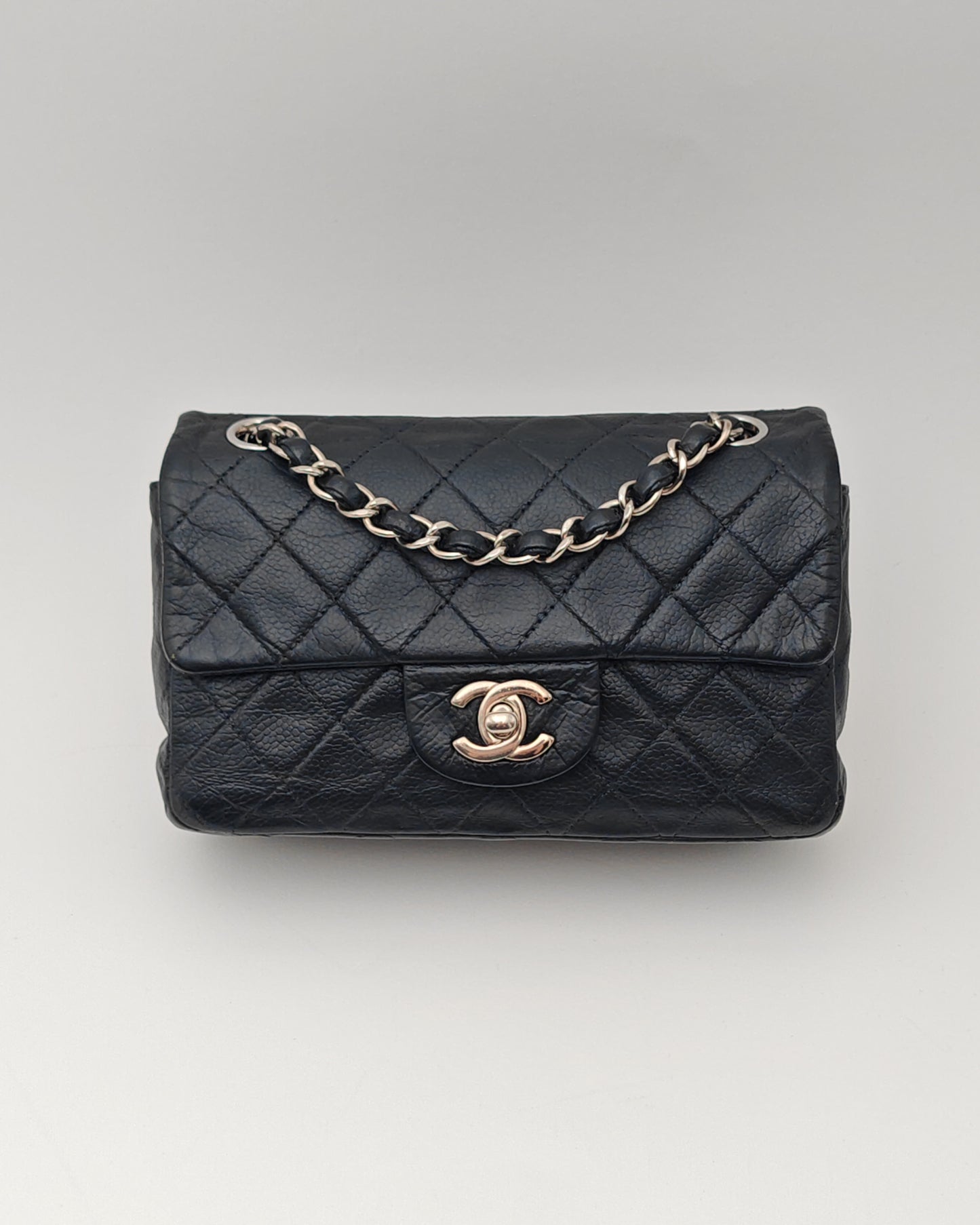 Chanel Classic Mini Flap Bag in Black Caviar with Silver Hardware