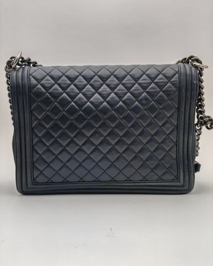 Chanel Boy Bag Large in Navy Quilted Calfskin with Ruthenium Hardware.