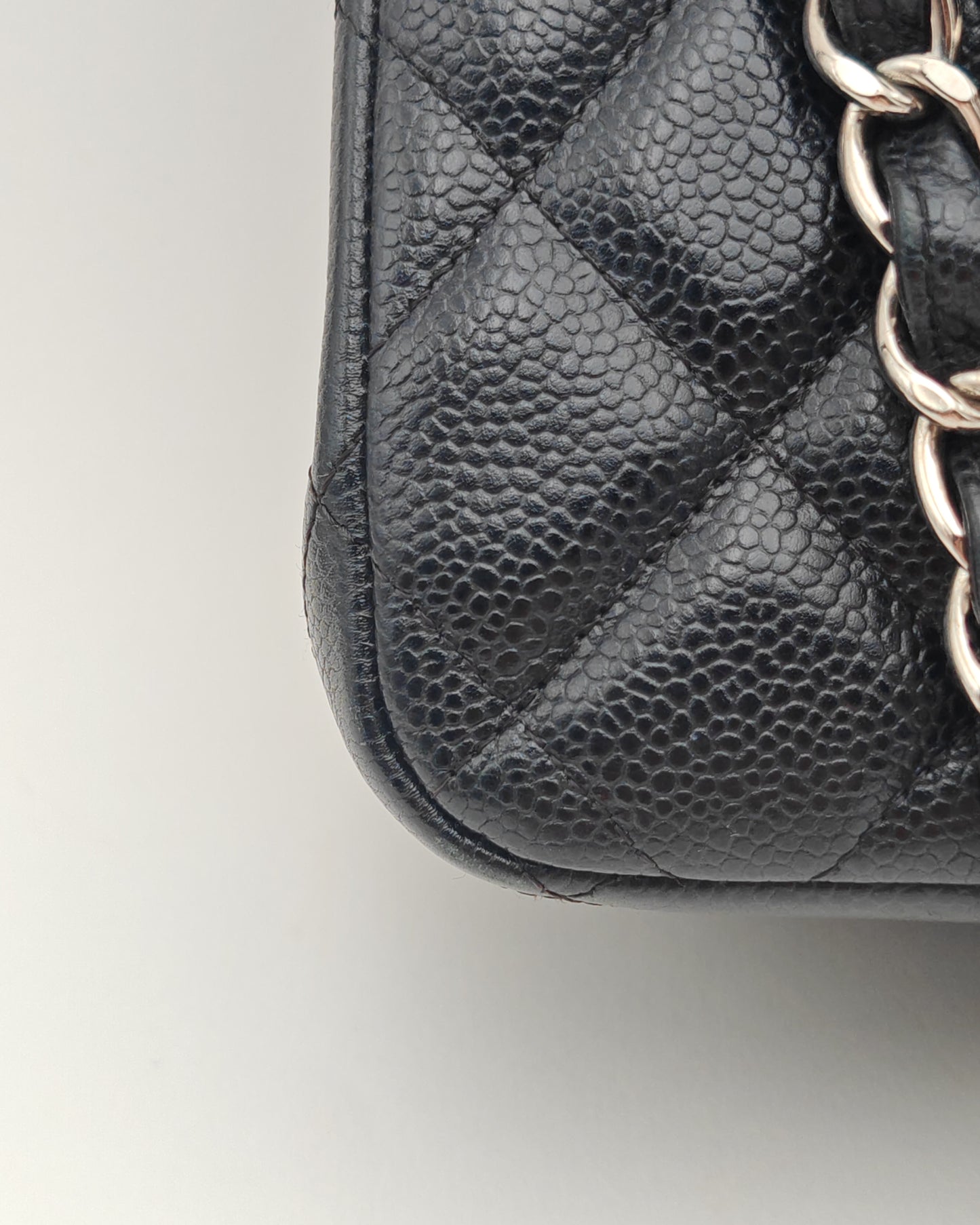 Chanel Classic Flap Bag – Jumbo Black Caviar Leather with Silver Hardware