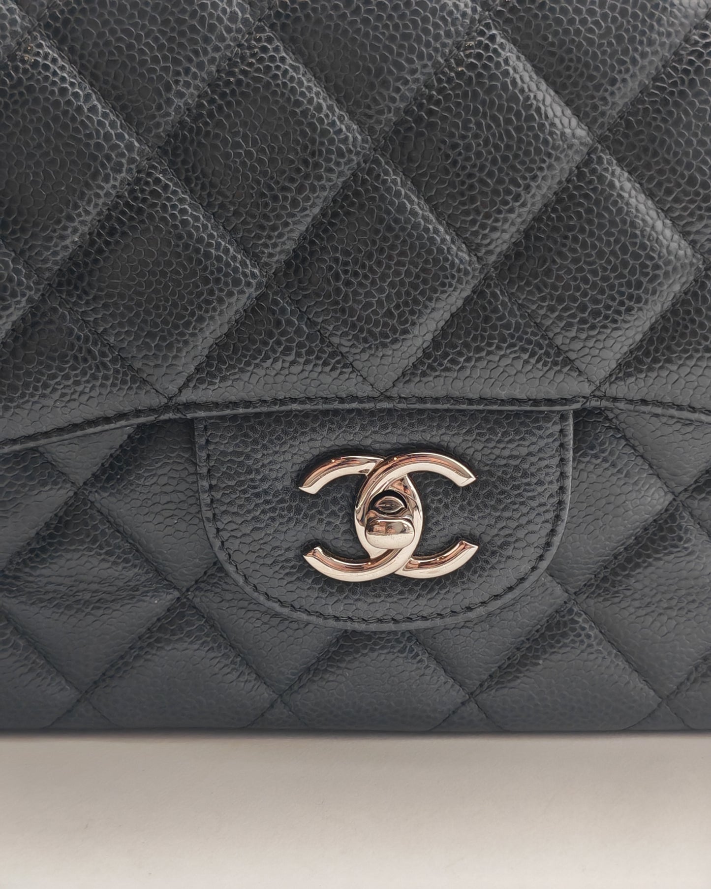 Chanel Classic Flap Bag – Jumbo Black Caviar Leather with Silver Hardware