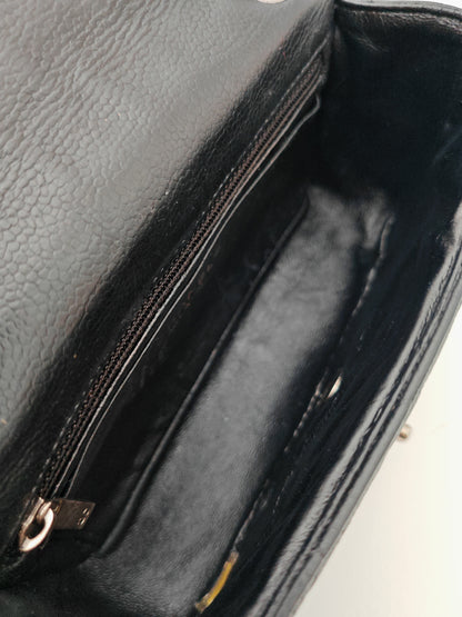 Chanel Classic Mini Flap Bag in Black Caviar with Silver Hardware