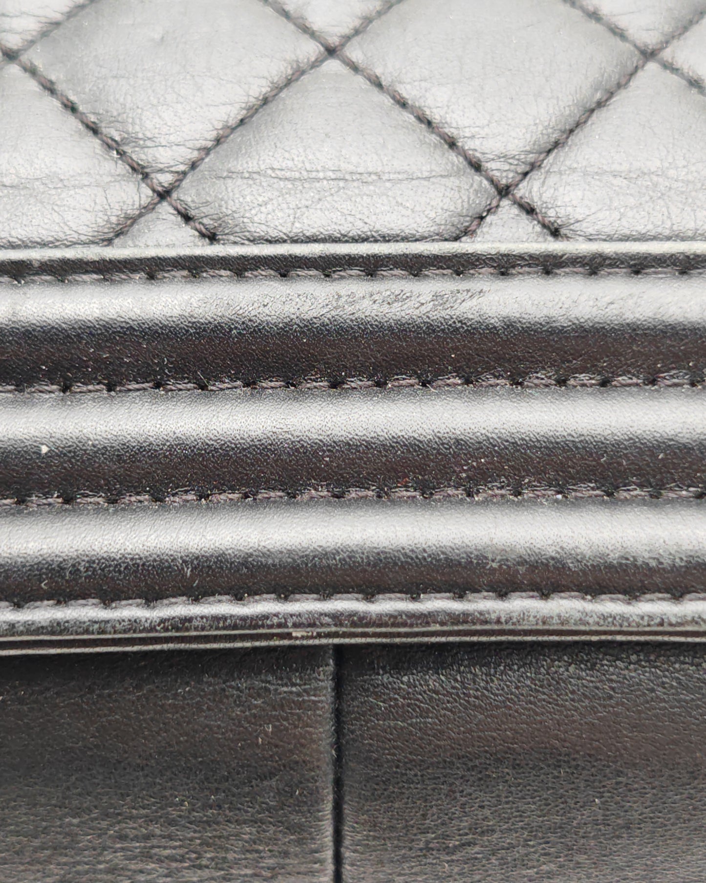 Chanel Boy Bag Large in Navy Quilted Calfskin with Ruthenium Hardware.