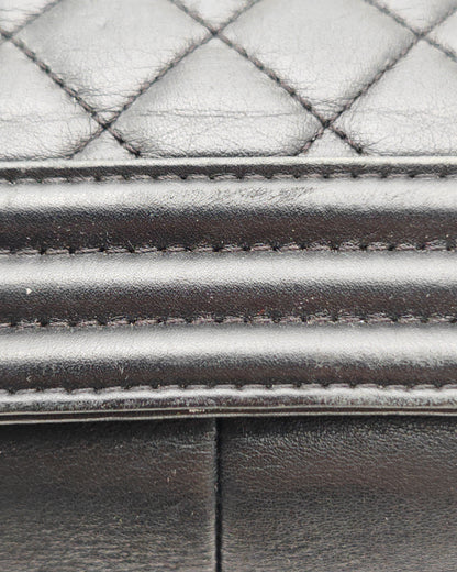 Chanel Boy Bag Large in Navy Quilted Calfskin with Ruthenium Hardware.