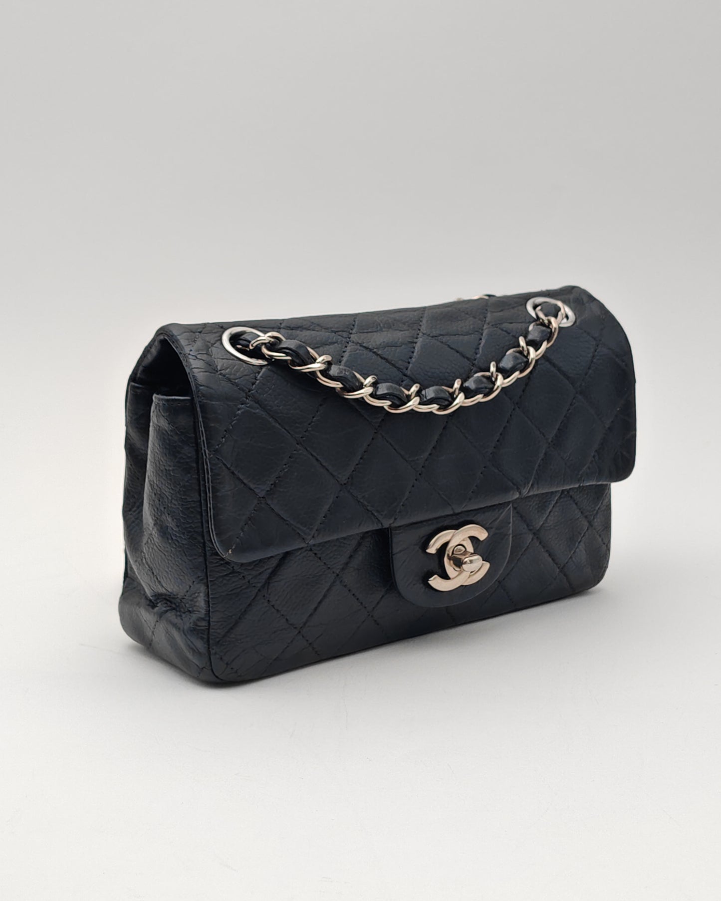 Chanel Classic Mini Flap Bag in Black Caviar with Silver Hardware