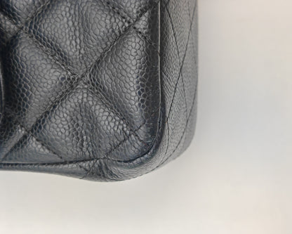 Chanel Classic Flap Bag – Jumbo Black Caviar Leather with Silver Hardware