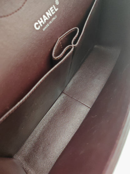 Chanel Classic Jumbo Double Flap Bag in Dark Burgundy Caviar Leather with Silver Hardware.