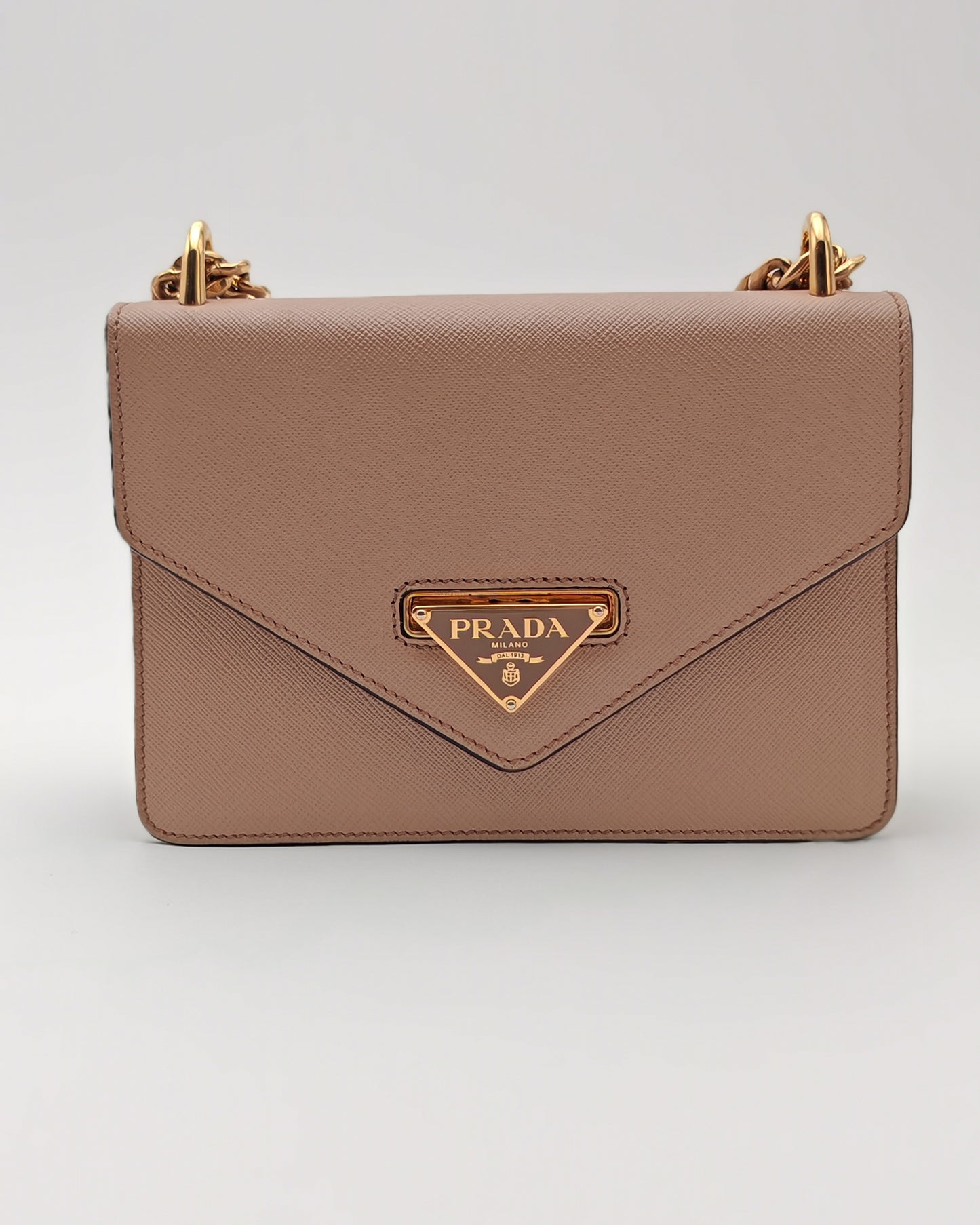 Prada Diagramme Envelope Shoulder Bag in Nude Saffiano Leather with Gold Hardware.