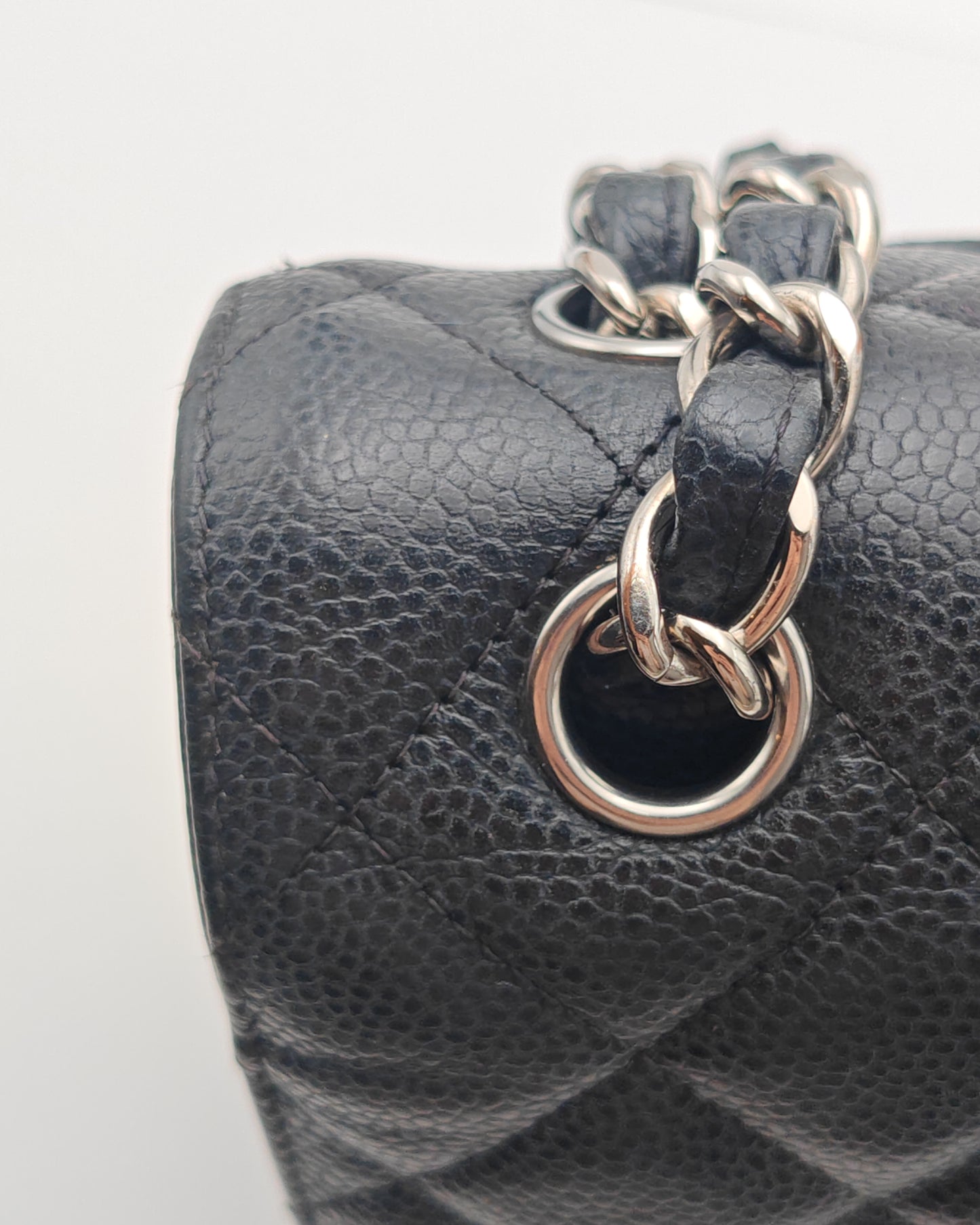Chanel Classic Flap Bag – Jumbo Black Caviar Leather with Silver Hardware