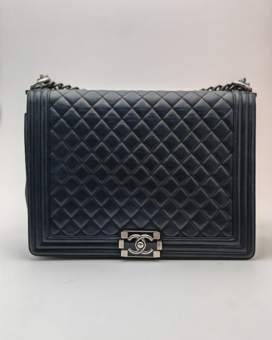 Chanel Boy Bag Large in Navy Quilted Calfskin with Ruthenium Hardware.
