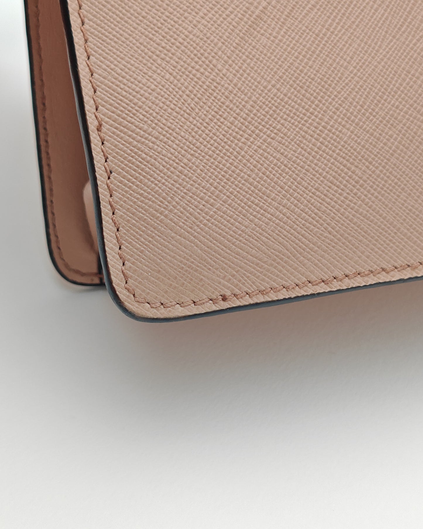Prada Diagramme Envelope Shoulder Bag in Nude Saffiano Leather with Gold Hardware.