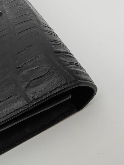 Saint Laurent Classic Monogram Clutch in crocodile-embossed leather